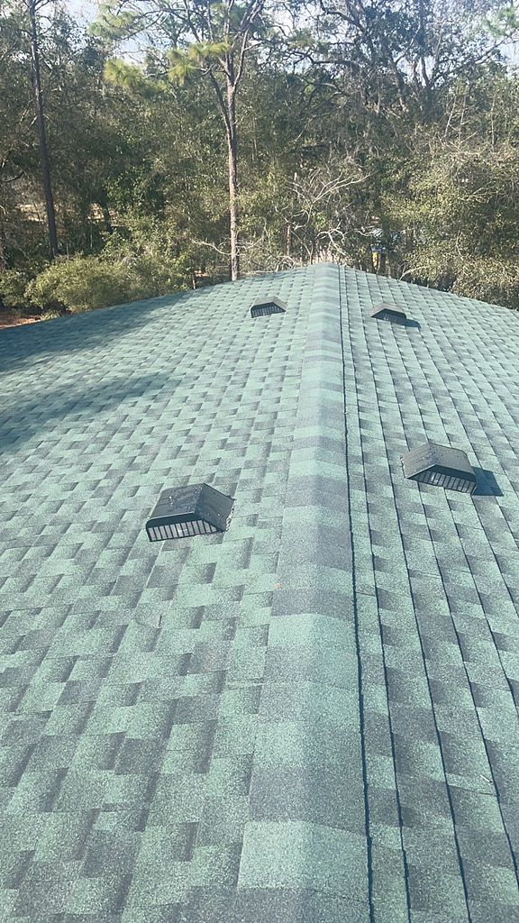 Hunter Green GAF Timberline HDZ architectural shingle roof installed on a home in Inverness, Florida